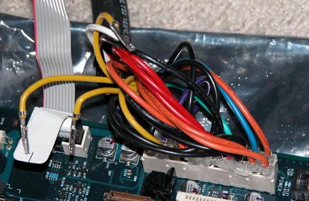 Hot gluing the MDD power supply connector modification together