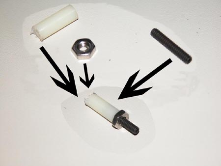 Screw-in case standoffs for mounting the logic board